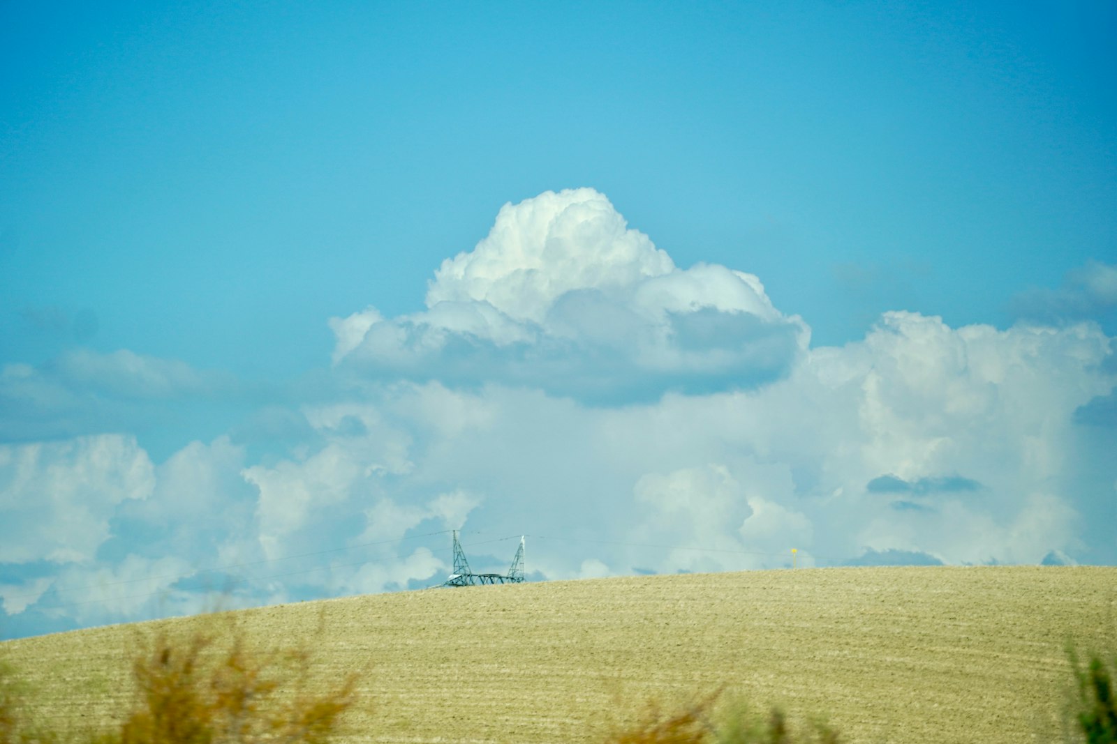 Blue sky with white clouds over the flying field